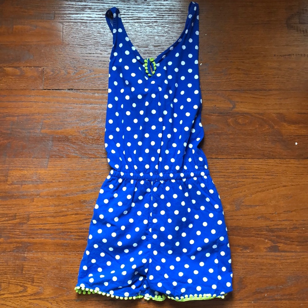 a blue and white poke a dot romper. worn once